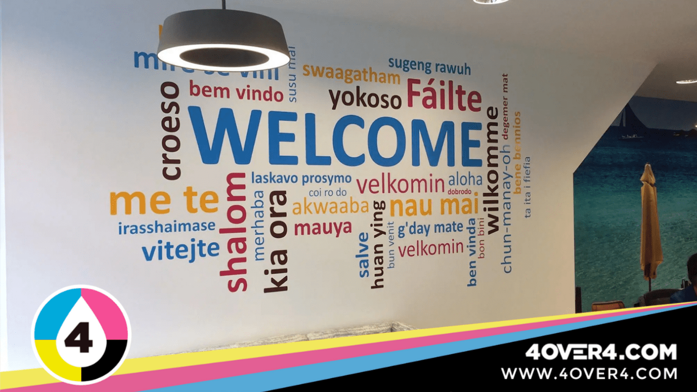 Welcome entrance wall graphic with colorful text