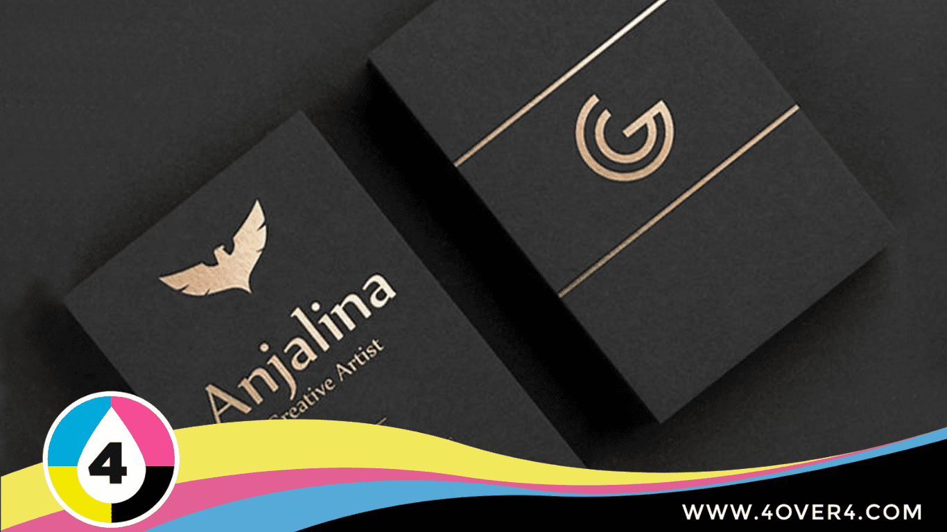 Black business card with golden logo at the back